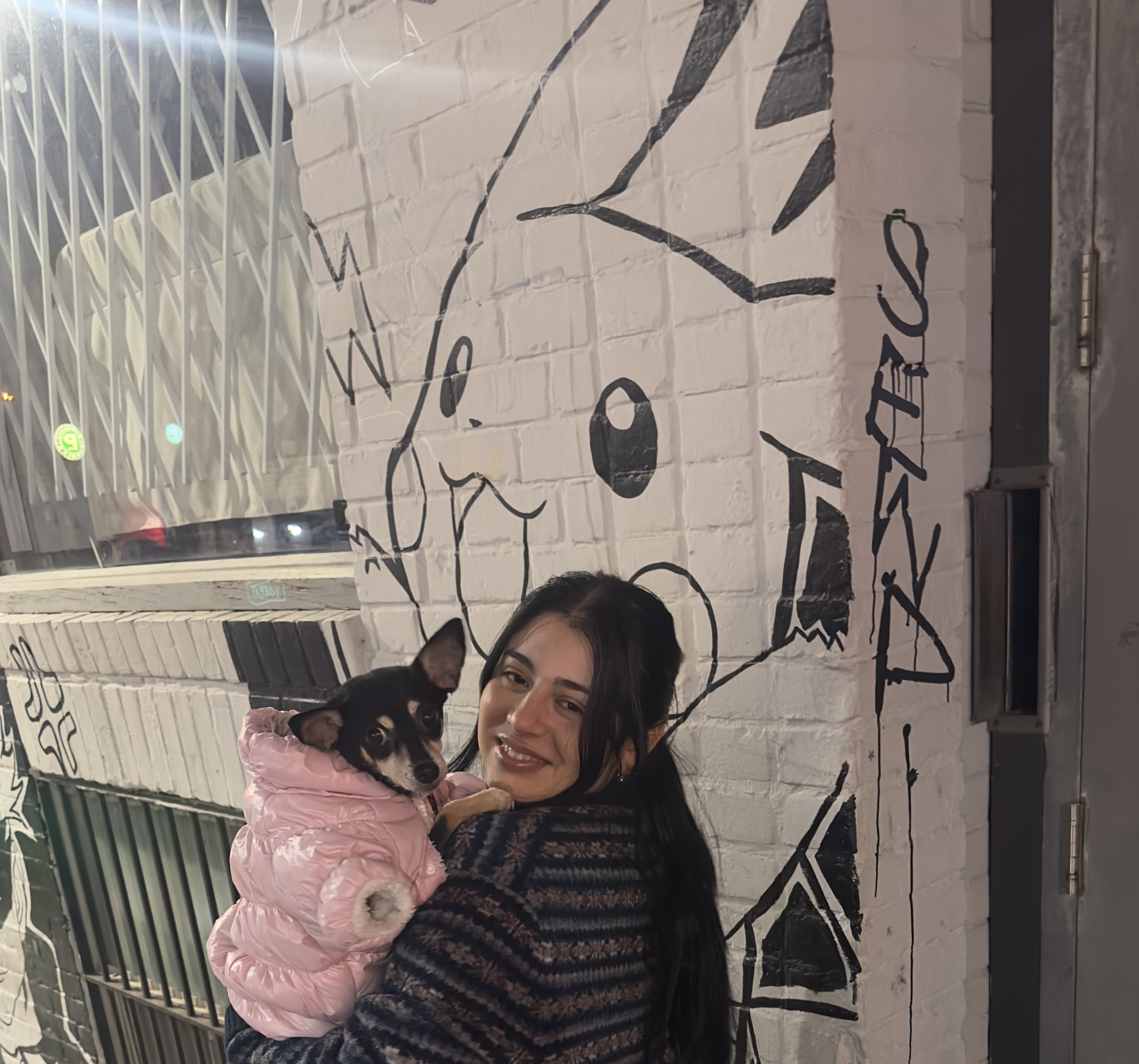 Sara Azari picture with a dog